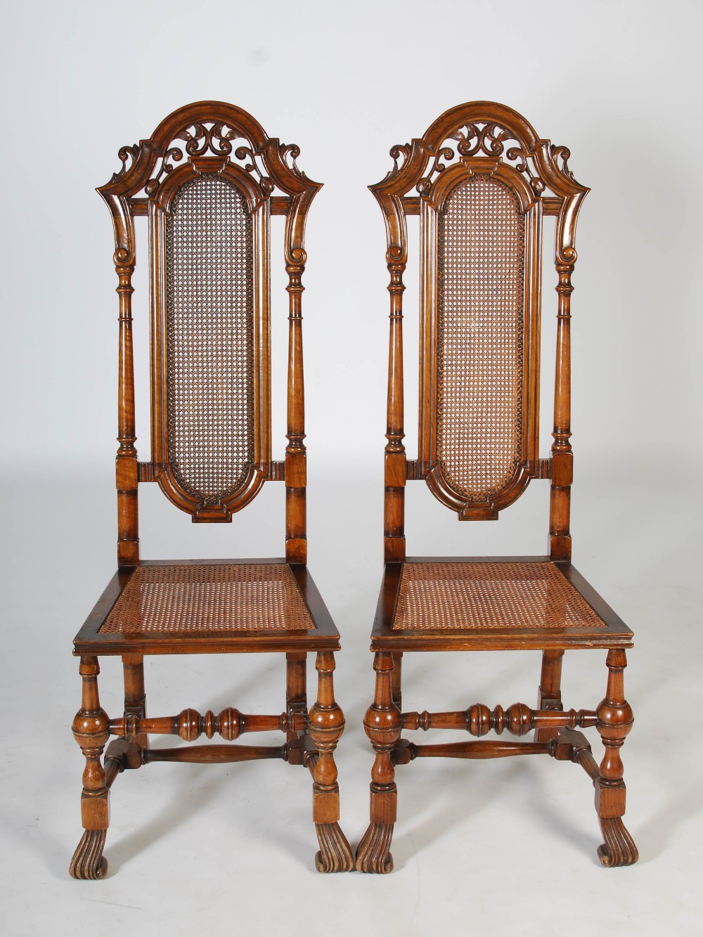 A pair of late 19th/early 20th century Continental walnut hall chairs, the upright backs with - Image 3 of 5