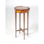 An Edwardian satinwood, mahogany and marquetry inlaid Sheraton style urn stand, the octagonal top