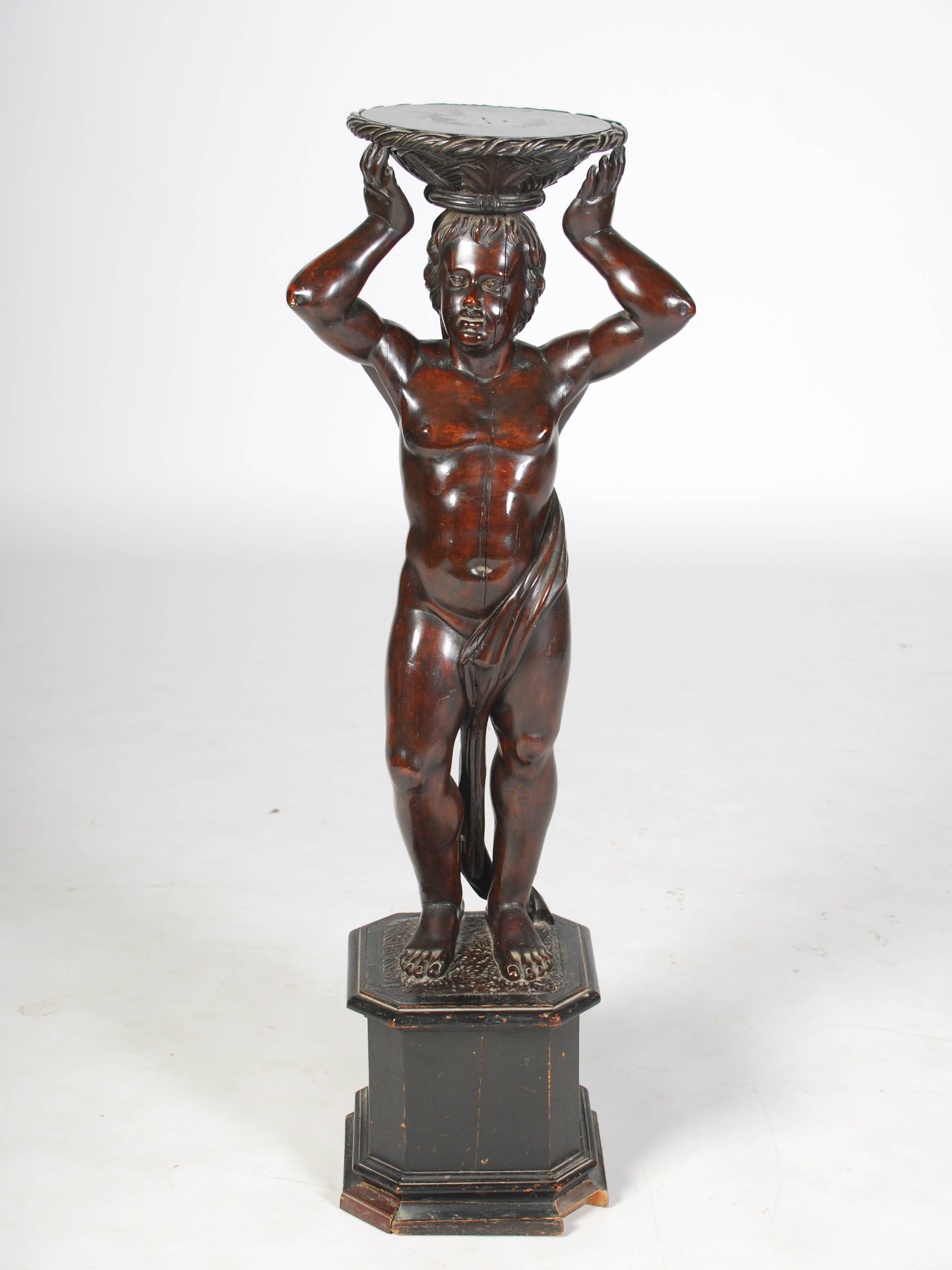 A late 19th century carved and stained wood figural torchere, carved with a semi clad male figure - Image 2 of 10