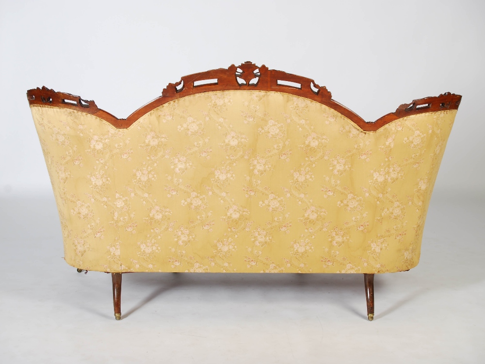 A Victorian mahogany sofa, the top rail carved and pierced with flowers and foliage above a back - Image 6 of 6