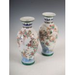 A pair of Japanese porcelain vases, late 19th/early 20th century, decorated with rockwork issuing