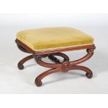 A Victorian rosewood X-frame dressing table stool, the upholstered seat raised on foliate carved X-