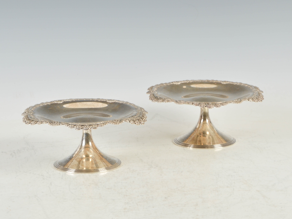 A pair of Tiffany & Co. Sterling Silver tazza, the shaped circular tops with chased and pierced