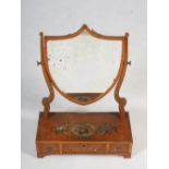 A 19th century painted satinwood dressing table mirror, the shield shaped mirror plate within shaped