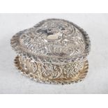 A Victorian silver heart shaped box and cover, London, 1894, makers mark of C.D., embossed with C-