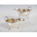 A pair of George V silver sauce boats, Sheffield, 1922, makers mark of M.H & Co.Ld., with scroll