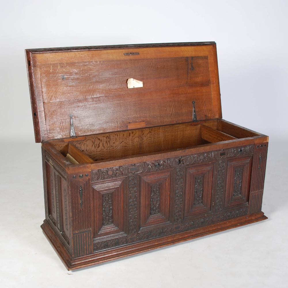 A 19th century Continental oak and ebony inlaid baroque style coffer, the hinged rectangular top - Image 5 of 6