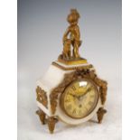 A late 19th/early 20th century French bronze and marble mantel clock, the circular dial with Roman