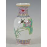 A Chinese porcelain famille rose vase, Republic Period, decorated with lotus and hummingbird, iron