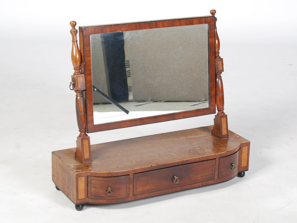 A 19th century mahogany and ebony lined dressing table mirror, the rectangular mirror plate within