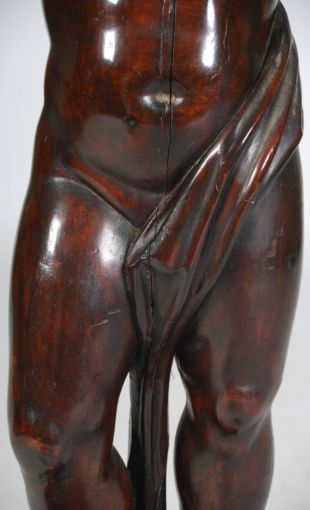 A late 19th century carved and stained wood figural torchere, carved with a semi clad male figure - Image 6 of 10