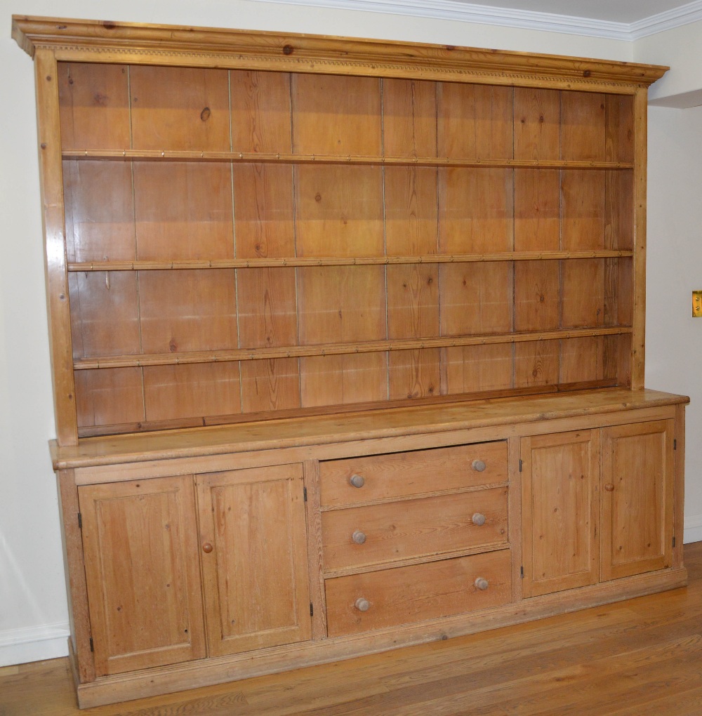 A late 19th/early 20th century pine country house kitchen dresser, the upper section with moulded - Image 3 of 5