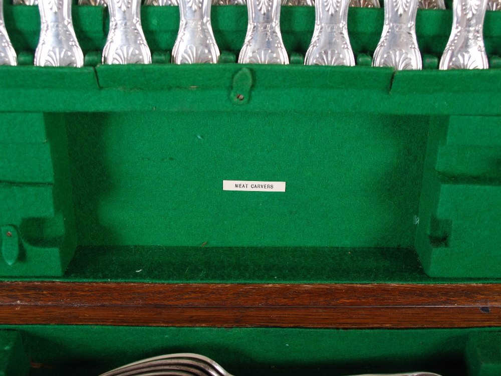 An early 20th century oak cased twelve place canteen of Kings pattern silver flatware and cutlery, - Image 3 of 12