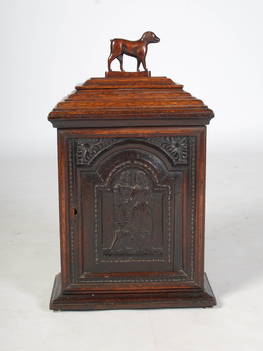 A 19th century oak table cabinet, the caddy top with detachable cover and dog carved finial, over an - Image 2 of 6