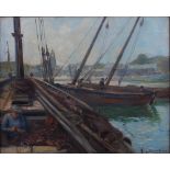 Patrick William Orr (fl.1889-1932) Harbour scene with fisherman tending his nets oil on canvas,