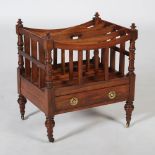 A 19th century rosewood Canterbury, the rectangular top with four divisions above a single frieze
