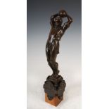 An early 20th century bronze figure of a footballer throwing the ball in, inscribed F.R. Cobeels
