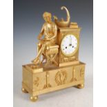 A 19th century French gilt metal Empire style mantel clock, Choiselat-Gallien, Paris, the circular