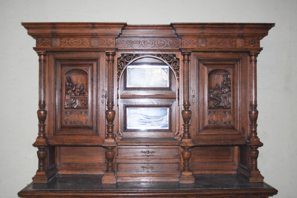 A late 19th century oak sideboard, the upright back with two bevelled mirror recesses and two - Image 2 of 8