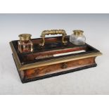 A 19th century rosewood and gilt metal mounted desk stand, of rectangular form with a central