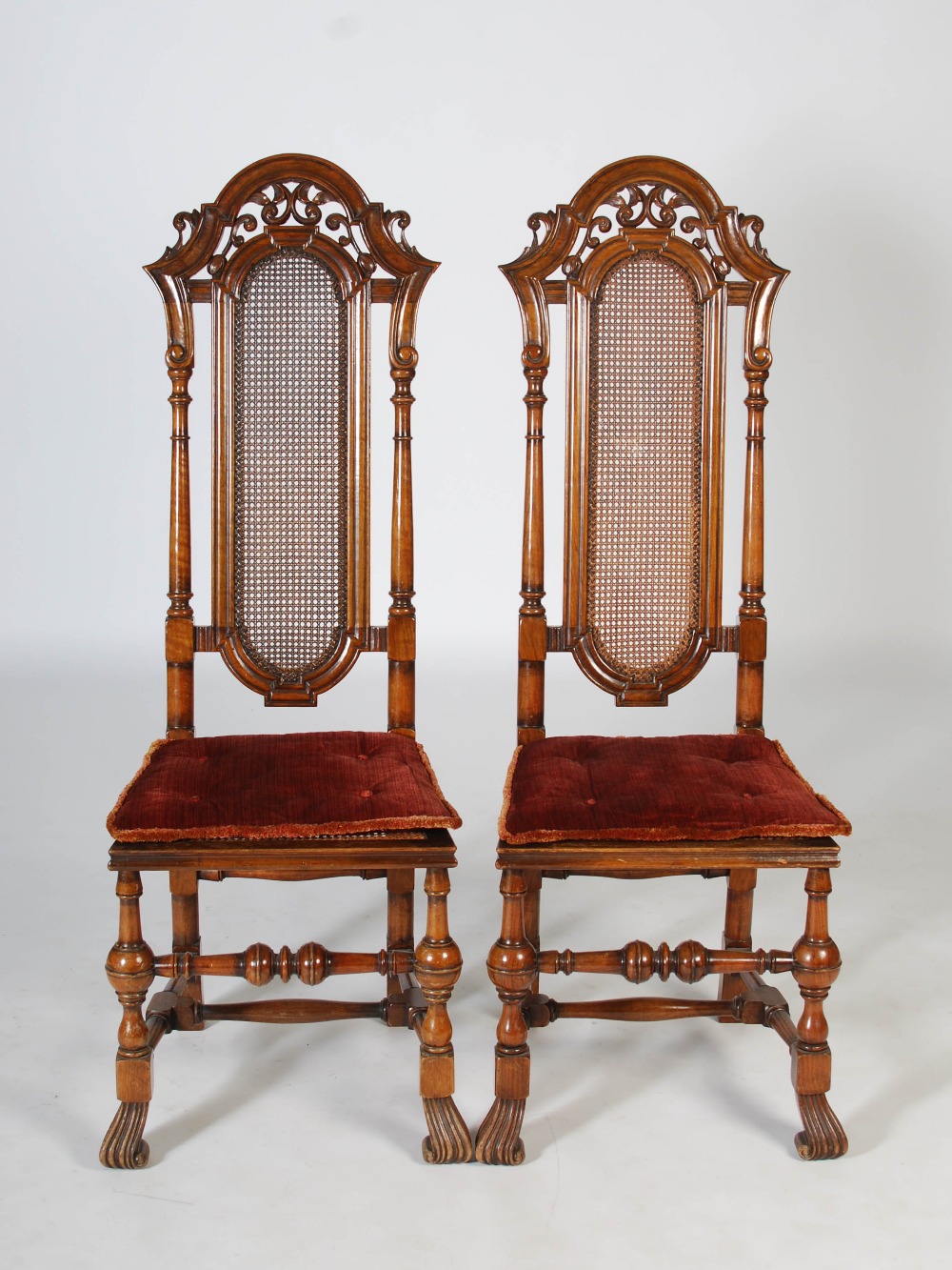 A pair of late 19th/early 20th century Continental walnut hall chairs, the upright backs with - Image 2 of 5