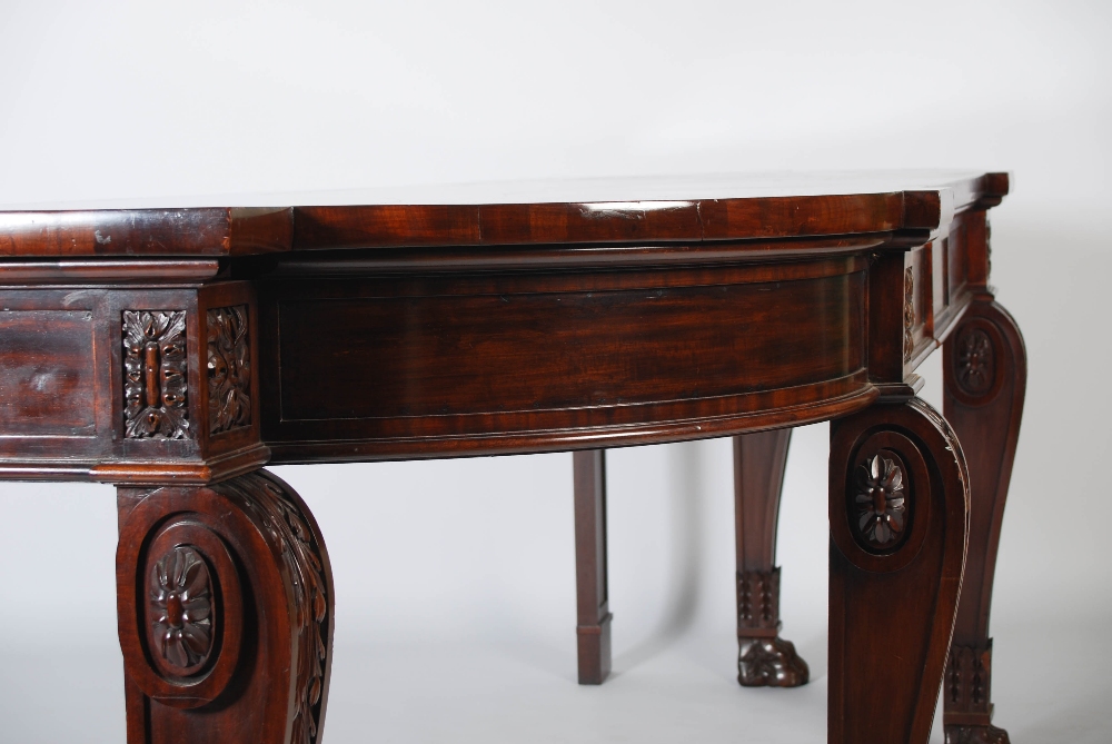 An impressive William IV mahogany serving table, the shaped rectangular top above two blind frieze - Image 12 of 18