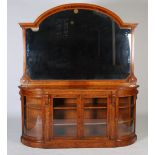 A Victorian walnut mirror back credenza, the upright mirror back above a base fitted with a pair