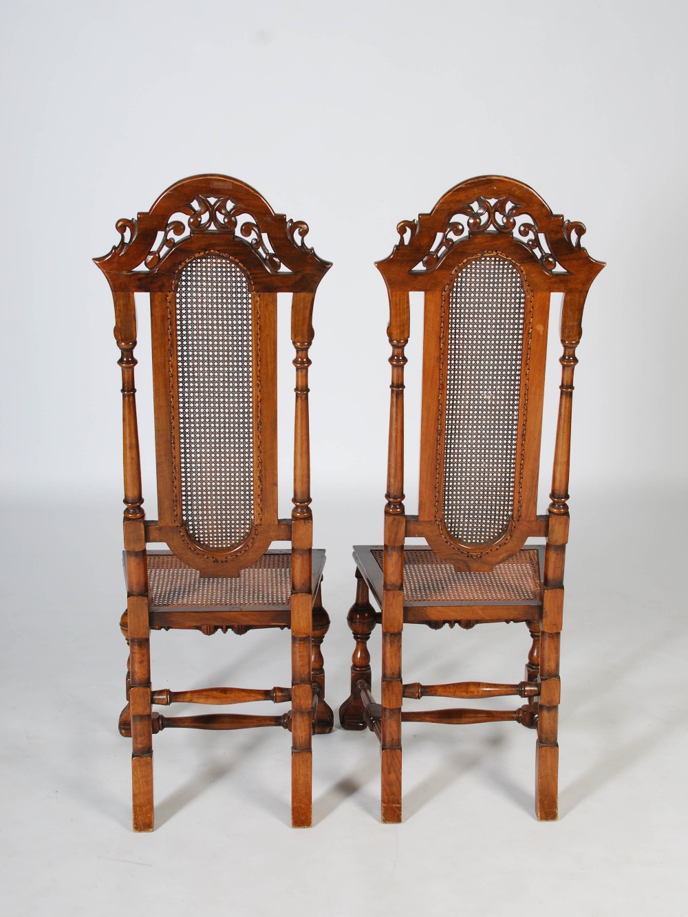 A pair of late 19th/early 20th century Continental walnut hall chairs, the upright backs with - Image 5 of 5