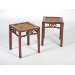 A pair of Chinese dark wood square shaped jardiniere stands, Qing Dynasty, the square shaped tops