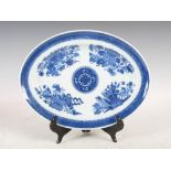 A Chinese porcelain blue and white oval shaped serving dish, Qing Dynasty, decorated in the Fitzhugh