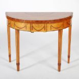 A George III satinwood and marquetry inlaid demi lune card table, the hinged top opening to a