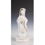 A Chinese porcelain blanc-de-chine figure of Guanyin, 33cm high.