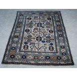 An Antique Shirvan Kuba rug, late 19th/ early 20th century, the off white ground decorated with