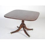 A 19th century mahogany and ebony lined snap top supper table, the rounded rectangular top on a