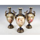 Three Vienna porcelain cobalt blue ground twin handled urns, decorated with oval shaped panels
