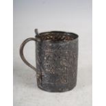 A 19th century Indian silver tankard, embossed with flowers and foliage within borders of fish, with