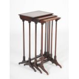 A nest of three 19th century rosewood occasional tables, the rectangular tops with a boxwood line