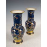 A pair of Carlton Ware blue ground Chinoiserie yen yen vases, blue printed marks and black painted