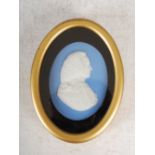 A Wedgwood blue ground Jasper Ware medallion depicting William Murray Earl of Mansfield (1705-1793),