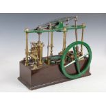 A late 19th/ early 20th century mahogany and brass model steam engine probably by Boulton & Watt, on