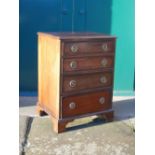 A 19th century mahogany dwarf chest, the rectangular top with a moulded edge over four long