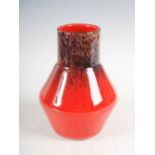 A Monart vase, shape B, mottled black and red with gold coloured inclusions, bearing original