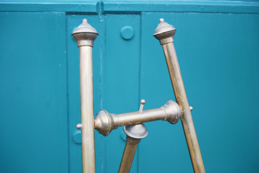 An early 20th century brass easel, 149cm high x 59cm wide. - Image 3 of 4