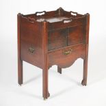 A George III mahogany tray top commode, the rectangular top with raised gallery and four kidney