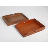 A near pair of 19th century mahogany butler's trays, each with raised three quarter gallery and