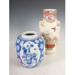 A Chinese porcelain blue and white jar, Qing Dynasty, decorated with four shaped panels enclosing