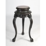 A Chinese dark wood and burr wood incense burner stand, Qing Dynasty, the circular top with a burr