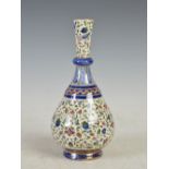 A Zsolnay pottery bottle vase decorated in the Isnik palette, blue printed and impressed marks, 22.