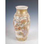 A large Japanese Satsuma pottery vase, Meiji Period, decorated with panels of scholars and samurai