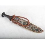 A late 19th/ early 20th century American Indian bead work knife sheath and knife, the sheath